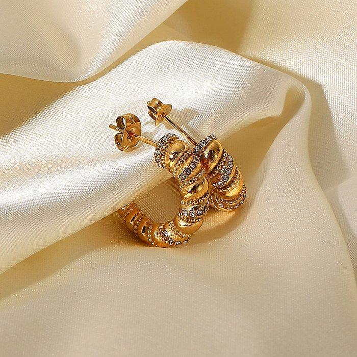 Zircon Twisted Hoops